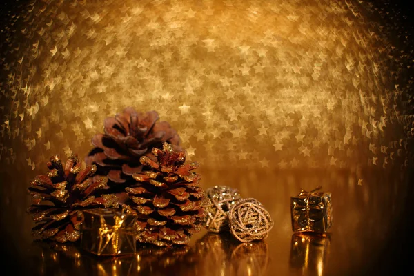 Christmas Decoration Pine Cones Decorative Gifts Golden Star Bokeh Background — Stock Photo, Image