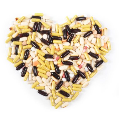 Birçok farklı renkli ilaç ve ilaç izole üzerinde beyaz arka plan yukarıda