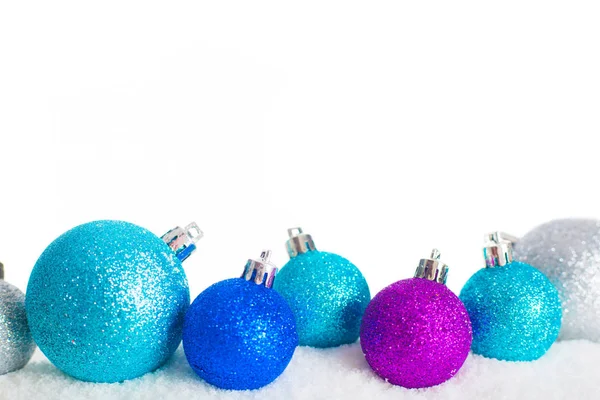Christmas balls on snow isolated — Stock Photo, Image