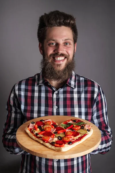 Happy Smiling Man Holding Home Made Heart Shaped Pizza — Stock Photo, Image