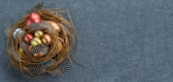 Easter nest with color eggs — Stock Photo, Image