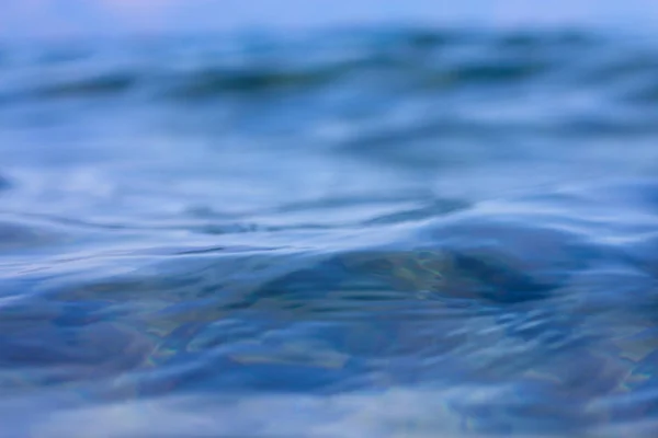Oberfläche des blauen Wassers — Stockfoto