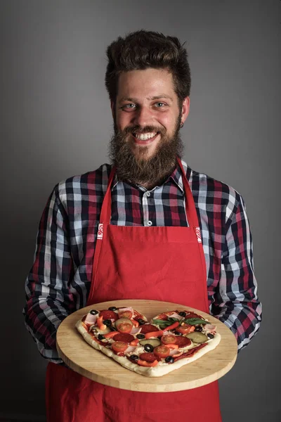 Man holding pizza — Stock Photo, Image