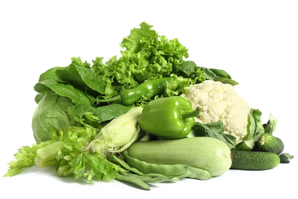 Green vegetables pile on white — Stock Photo, Image