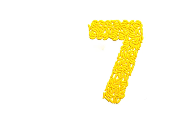 Numero Sette Realizzato Con Caramelle Alla Banana Sfondo Bianco — Foto Stock