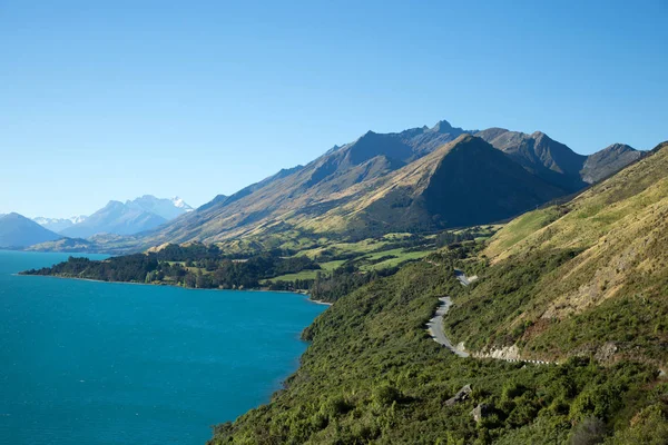 Beautiful view the Wakatipu lake and the devils staircase road surrounded by mountains