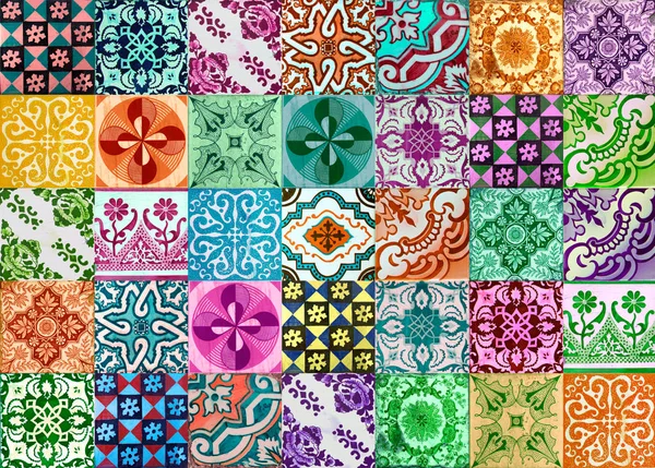 Photograph of traditional portuguese tiles in different colours.  Pink, purple, blue, turquoise and green.