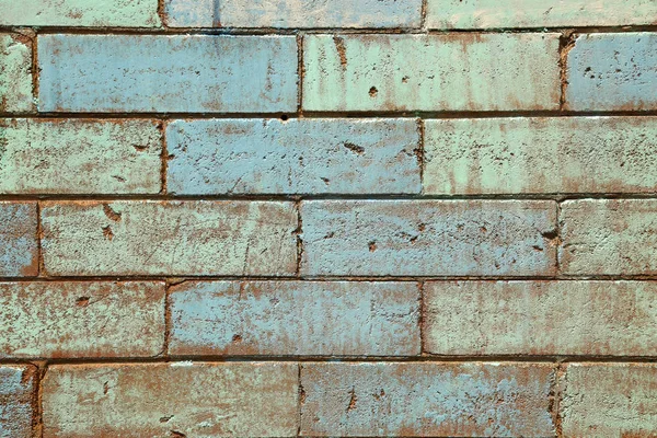 Groene mint en bleke blauwe peint bakstenen muur — Stockfoto
