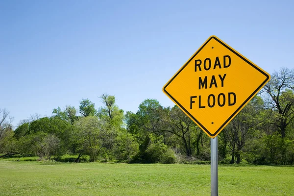 Road May Flood Sign