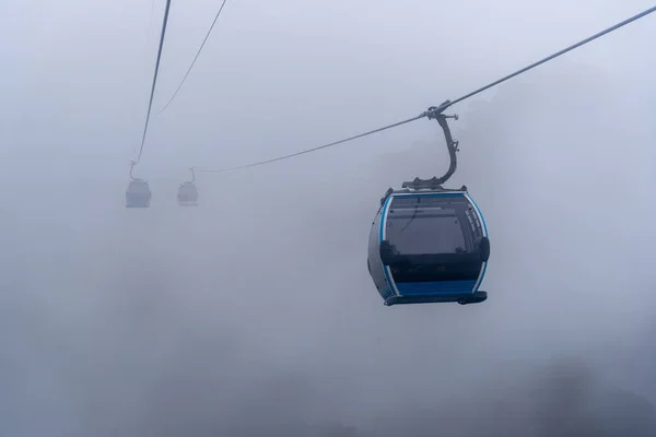 Cable car in the fog.Beautiful nature trail (da nang,vietnam)