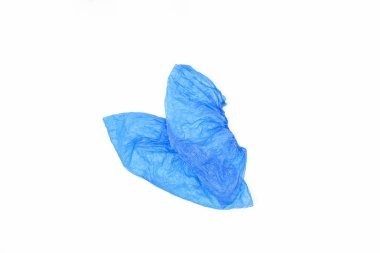 Beyaz zemin üzerine mavi Tıp galoş. Sağlık kurumlarında temizlik. Üstten görünüm