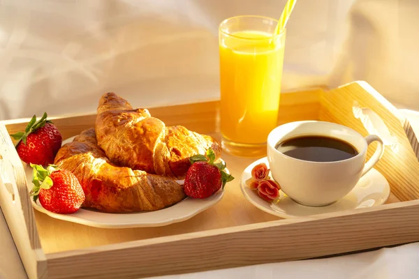 Breakfast Bed Tray Coffee Croissants Juice Fresh Strawberries Early Morning — Stock Photo, Image