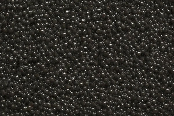 背景としてブラックキャビアクローズアップ 黒キャビアの質感 — ストック写真