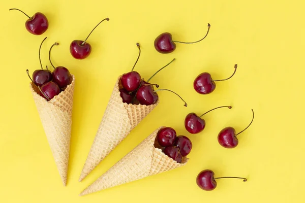 Ice Cream Cone Filled Fresh Cherries Yellow Background Cherry Waffle — Stock Photo, Image