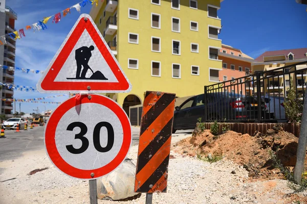 Roadwork and speed limit traffic signs in Yehud - small city in central Israel. — Stock Image Roadwork Speed Limit Traffic Signs Yehud Small City Central Israel Royalty Free Stock Photos
