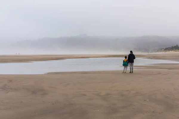 Beautiful misty ocean shore at Cannon Beach, Oregon in the summer of 2020
