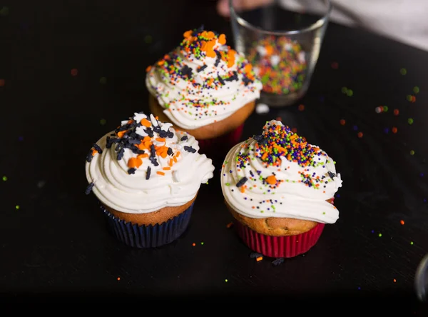 Boy Face Paint Decorating Spooky Halloween Cupcakes — Stock Photo, Image