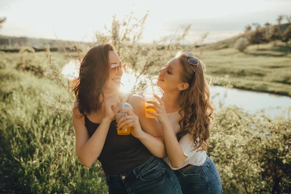 Two Nice Girlfriends Having Cocktail Straw Having Fun Sunset Positive — Stock Photo, Image