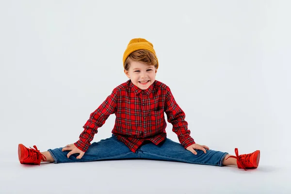 Little boy looking at camera with his legs apart, — Stock Photo, Image