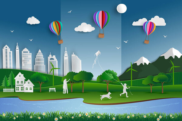 Save the environment and energy concept,Eco friendly city with happy family on paper art scene background