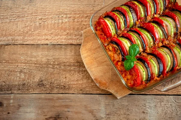 Ratatouille - Traditional Dish Of Provencal Cuisine. Healthy Vegetable Food. Wooden Background — Stock Photo, Image