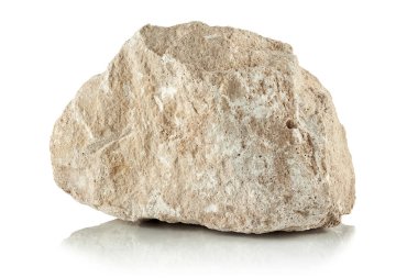 Beyaz arka planda bir kireç taşı parçası