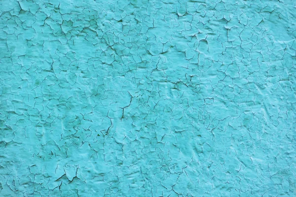 Одноколірна пофарбована тріснута текстура стін. Фон — стокове фото