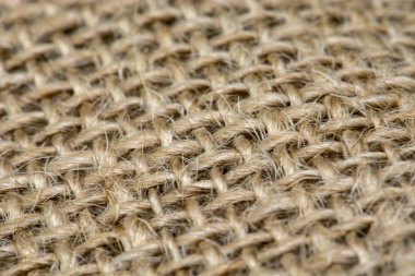 Pastel kendir veya çul kumaş doku arka plan. Sanatsal wale keten tuval duvar kağıdı. Alan, seçici odak, sanatsal bokeh, sığ derinliği arka plan bulanık