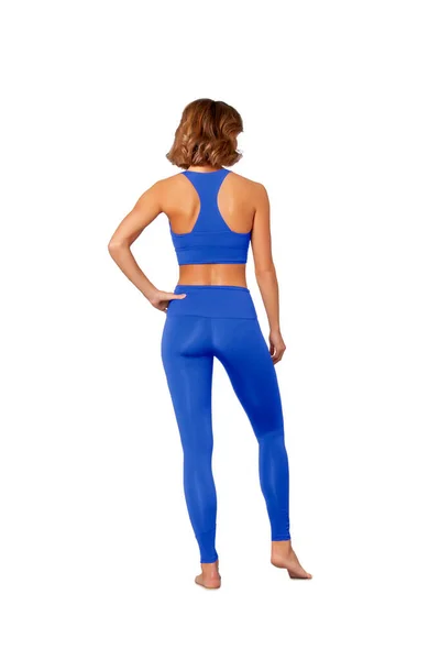 Fitness Meisje Felblauwe Sweatsuit Met Perfecte Figuur Staat Blootsvoets Geïsoleerd — Stockfoto