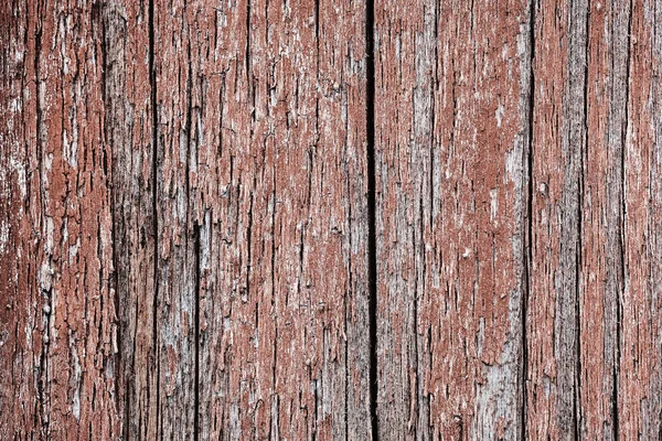 나무 표면에 오래된 박리 페인트. 붉은 페인트에 그려진 복고풍 벽의 배경 — 스톡 사진