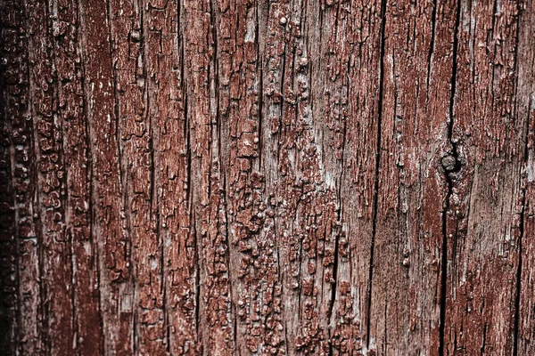 나무 표면에 오래된 박리 페인트. 붉은 페인트에 그려진 복고풍 벽의 배경 — 스톡 사진