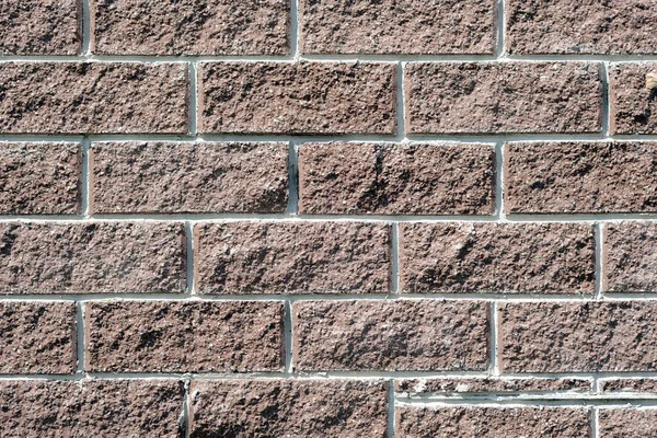 stone cladding of a brick wall of a building