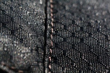 Kumaş dokusu arka planı. Tuval tekstil malzemesinin ayrıntıları.