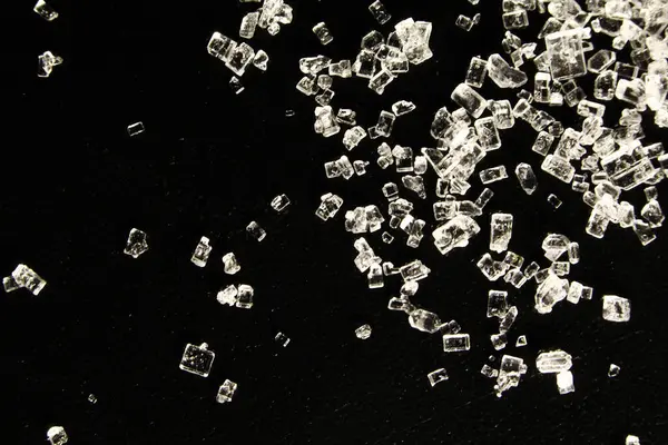 Sea salt on a black background. — Stock Image Sea Salt Black Background Royalty Free Stock Images