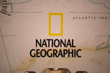Bratislava, Slovakia, July 3, 2018: National Geographic logo on world map clipart