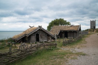 FOTEVIKEN, SWEDEN - CIRCA JUNE 2016: Foteviken is a viking reservation skansen outdoor museum located in the south of Sweden clipart