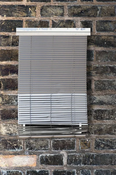 Run Gray Venetian Blind Front Window Ancient Brick Wall — Stock Photo, Image