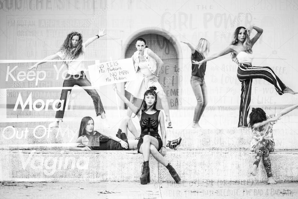 black and white shot of women with slogans for womans day