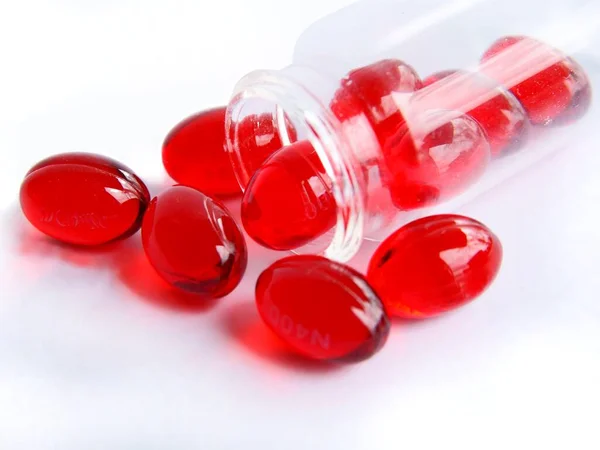 Capsules Rouges Comme Médicament Contre Douleur Photos De Stock Libres De Droits