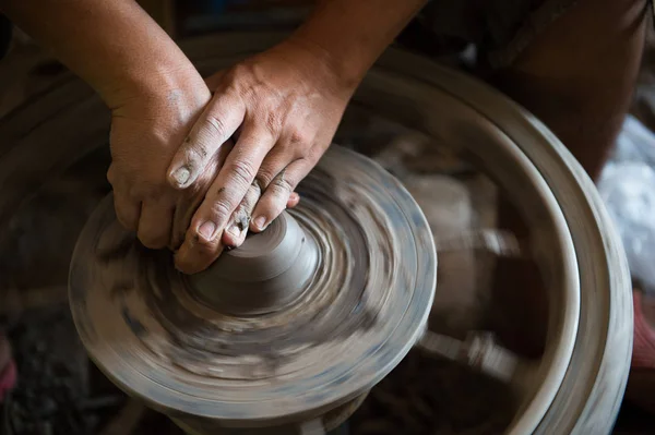 Closeup of sculptor man hand with him job