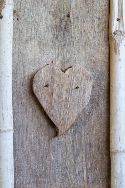 Heart shape of wooden background — Stock Photo, Image