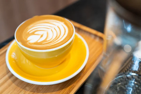 Latte Art Coffee Cup Yellow Glass Wood Plate — Stok Foto