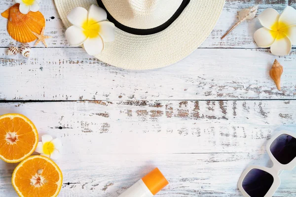 Beautiful summer holiday, Beach accessories, orange, sunglasses, hat and shells on wooden backgrounds — Stock Photo, Image