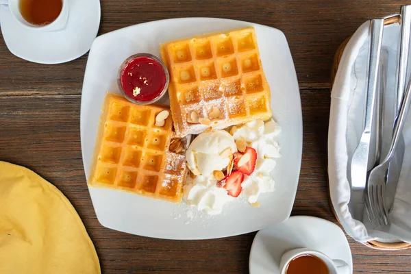 Waffle Topped Strawberry Syrup Icecream Whipped Cream Almond Slice — Stock Photo, Image