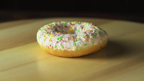 Donut on the table. video rotation. — Stock Video