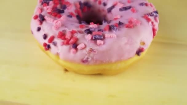 Donut on the table. video rotation. — Stock Video