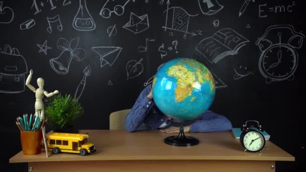 Schoolgirl, student sitting at a Desk, doing homework. Education at school, College, University — Stock Video