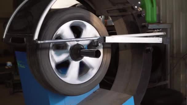 Car wheel balancing in tire service. — Stock Video
