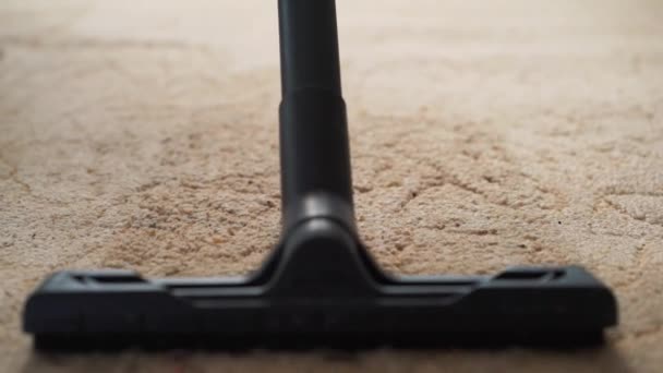 Vacuum cleaner cleaning the carpet. — Stock Video