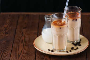 Fresh iced coffee in a tall glasses